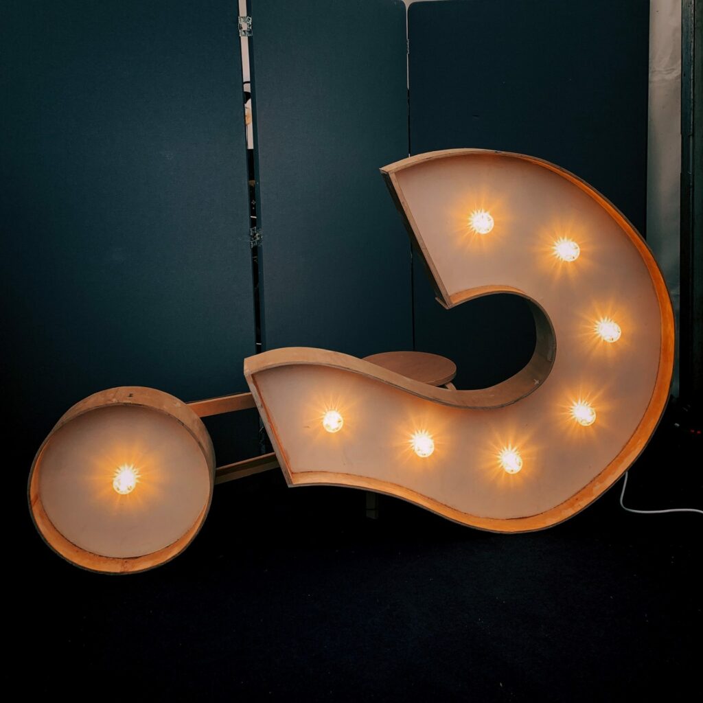 Question mark with lights inside on its side