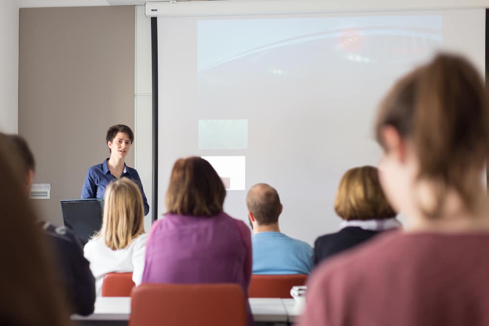 Female speaker at a seminar