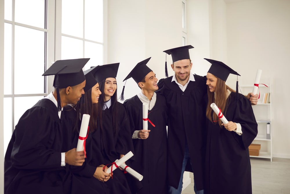 Group of happy college graduates