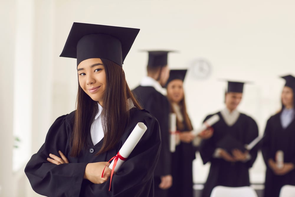 Portrait of female Asian graduating student