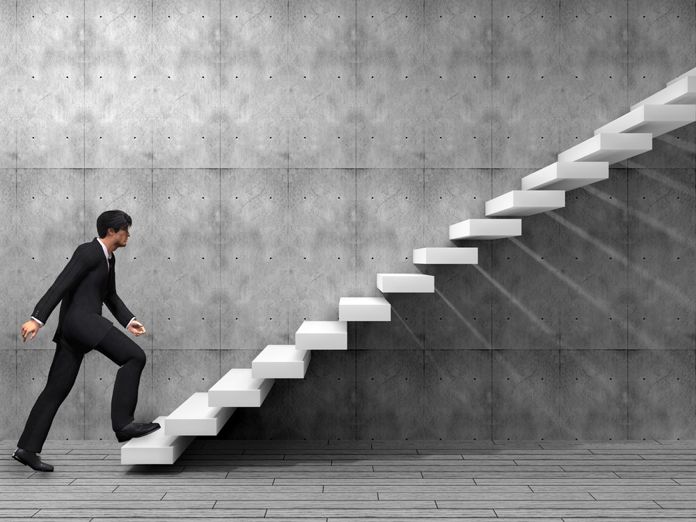 Professional businessman climbing 3D stairs