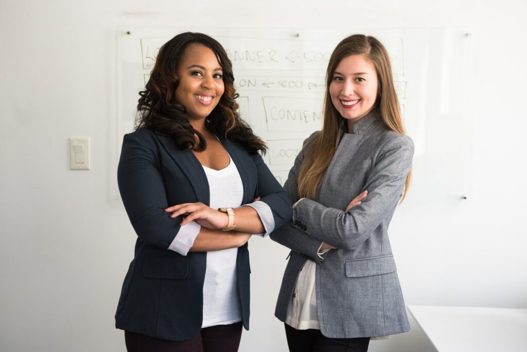 two women standing side by side