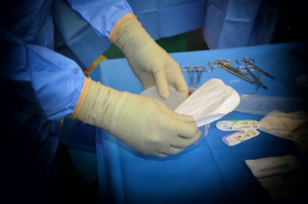 Surgical intern preparing the theatre for surgery